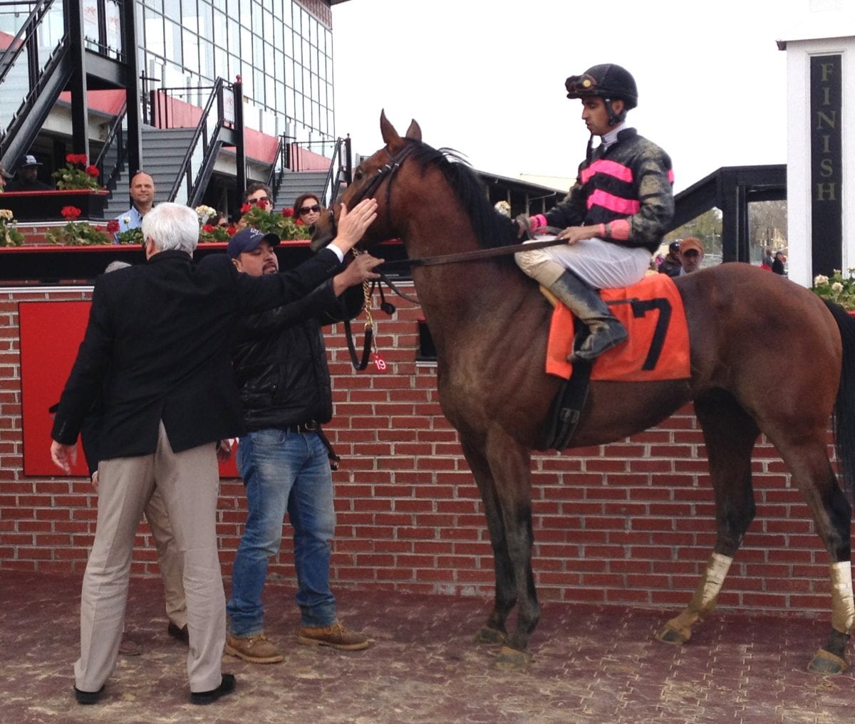 Kid Cruz gets a pat from co-owner Steven Brandt following Saturdayâ€™s ...