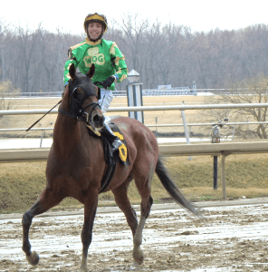 Angel Cruz -- all smiles aboard Bridget's Big Luvy. Photo by The Racing Biz.
