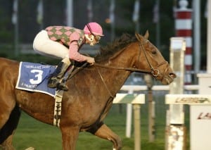 Ramon Dominguez and A Huevo upset the 2003 DeFrancis Dash.  Photo by Jim McCue, Maryland Jockey Club.