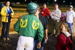 Gustavo Larrosa gets the winner's reward after piloting Lucy's Bob Boy in the Wild and Wonderful.  Photo by Vas.