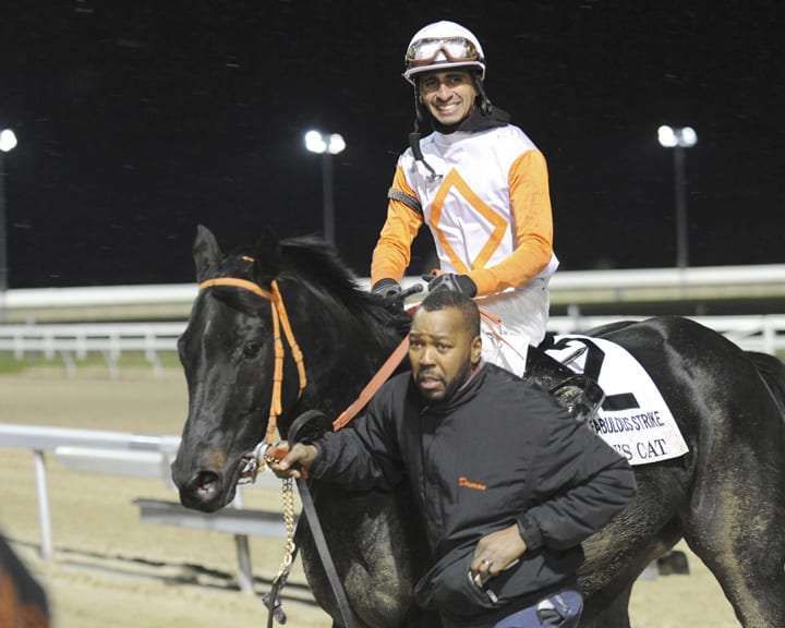 Julian Pimentel aboard Ben's Cat after the 2013 Fabulous Strike.  Photo by B & D Photography.