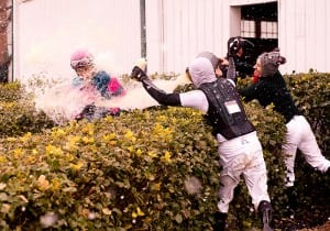 Bug rider Nik Juarez gets a bath in honor of his first win.  Photo by Jim McCue, Maryland Jockey Club.