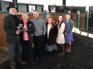 Maryland Racing Media Association president Ted Black (far left) presents the Maryland-based Horse of the Year trophy to owner Susan Wantz, trainer Ollie Figgins, III, and the Figgins family.  Photo by The Racing Biz.