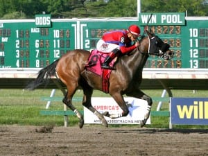 Natalie Victoria #8 with Jose Ortiz riding won the $75,000 Monmouth Beach Stakes at Monmouth Park on Sunday May 25, 2014.  Photo by Aubrey Therkelsen/EQUI-PHOTO.