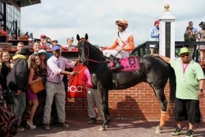 Ben's Cat has made a habit of visiting the winner's circle in the mid-Atlantic.  But he's never been to Belmont before. Photo by Laurie Asseo.