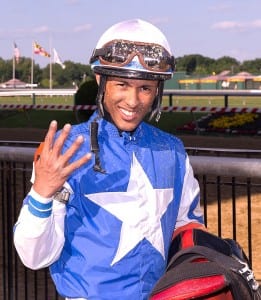 Victor Carrasco posted four wins at Pimlico on May 31, 2014. Photo by Jim McCue, Maryland Jockey Club.