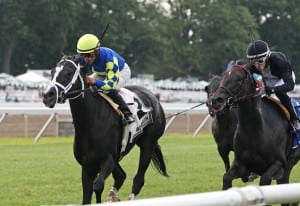 Patsy's Holiday comes on to win the Desert Vixen.  Photo By Bill Denver/EQUI-PHOTO