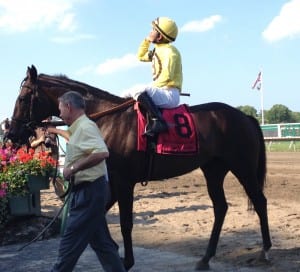 A thankful Paco Lopez after the Oceanport. You'd think, with more than 80 wins at the meet, he'd be used to this by now! Photo by The Racing Biz.