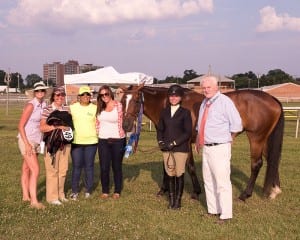 Sabrina Moore holds Totally Thoroughbred Horse Show champ My Fantastic Lady. Photo by Jim McCue, Maryland Jockey Club.