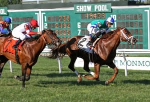 Eddie Castro and Winning Cause hold off Big Blue Kitten to win the Grade 3 Cliff Hanger at Monmouth. Photo By Aubrey Therkelsen/EQUI-PHOTO