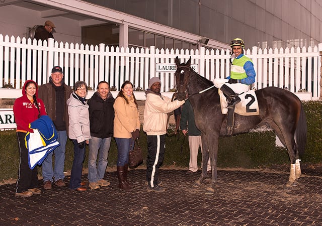 The T Sizzle winner's circle, part of trainer Mike Trombetta's big day. Photo by Jim McCue, Maryland Jockey Club.