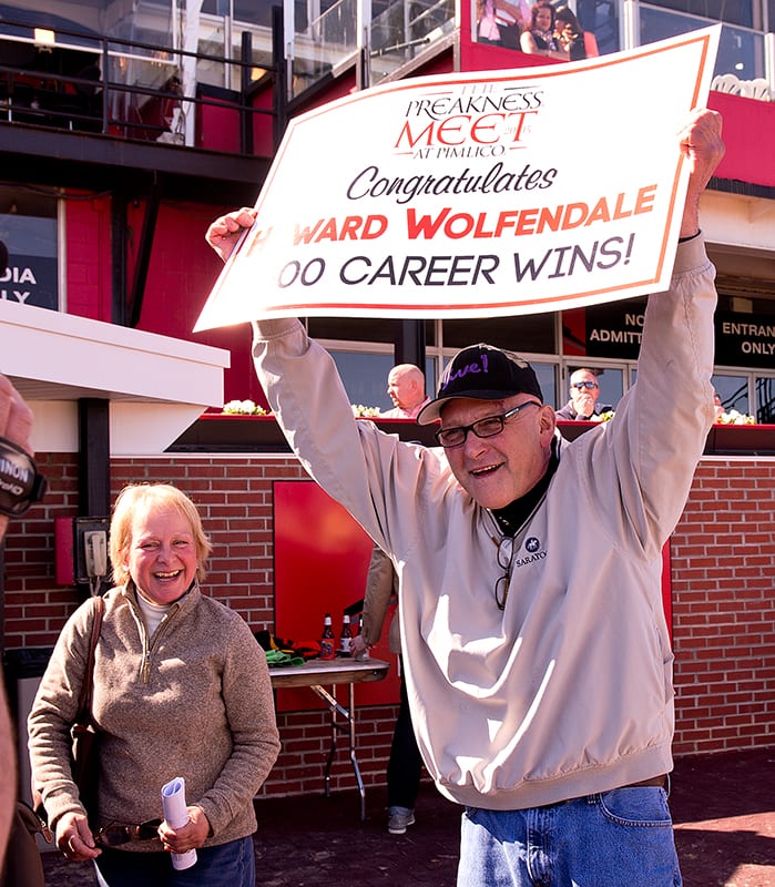 Howard Wolfendale celebrates the 1,500th win of his training career. Photo by Jim McCue, Maryland Jockey Club.