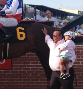 Jose Corrales and son Pachi enjoyed Bodhisattva's win in the Federico Tesio Stakes. Photo by The Racing Biz.