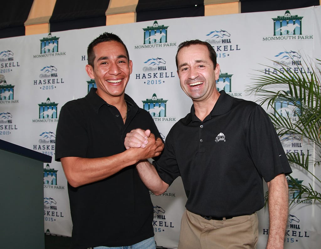 Paco Lopez (left) -- last year's riding leader at Monmouth Park -- and 13-time leader Joe Bravo laugh it up at Monmouth Park's opening press conference. Photo By Bill Denver/EQUI-PHOTO.