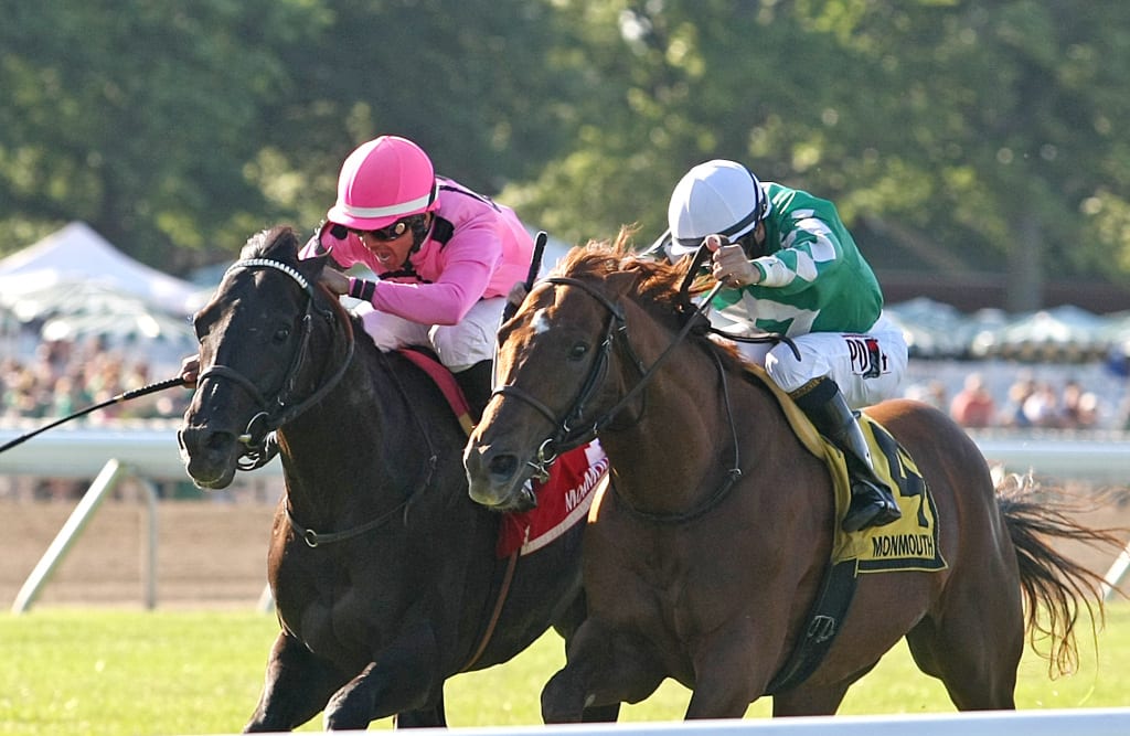 Triple Threat (outside) edged Middleburg to win the G2 Monmouth Stakes. Photo By Bill Denver/EQUI-PHOTO