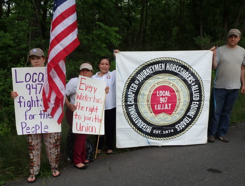 Strikers outside the entrance to Penn National Saturday evening. Photo by The Racing Biz.