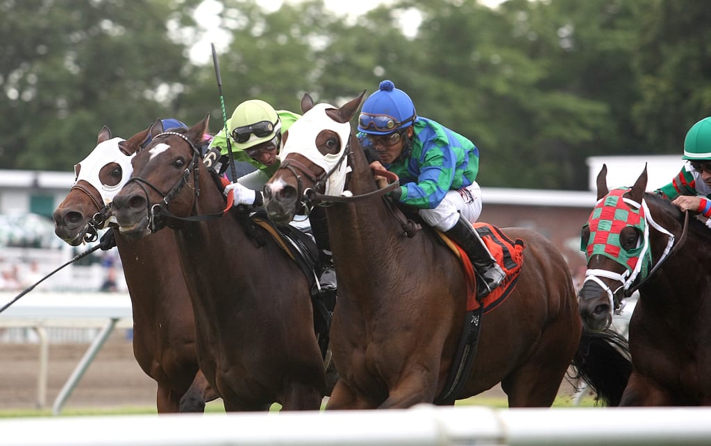 Kharafa got through late to score narrowly over Lochte in the Elkwood at Monmouth Park. Photo By Ryan Denver/EQUI-PHOTO