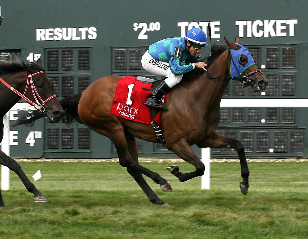 Kiss the Daddy rallied late to take the Power by Far at Parx Racing. Photo by Barbara Weidl/EQUI-PHOTO