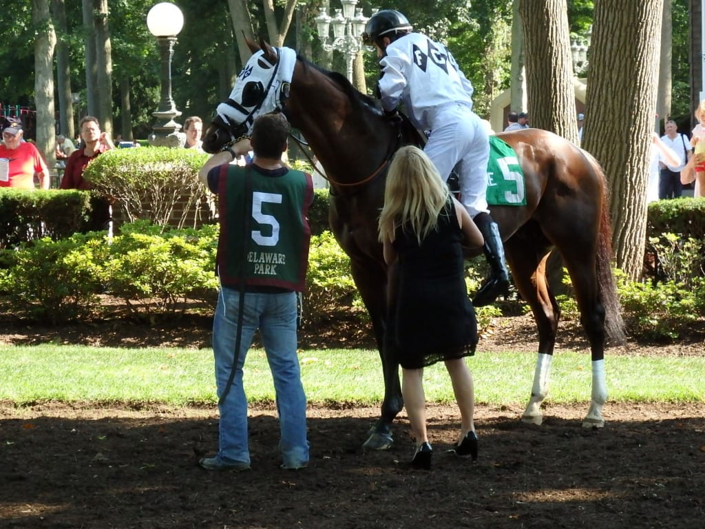 Kathy Ritvo gives son Michael a leg up on Fast Anna.