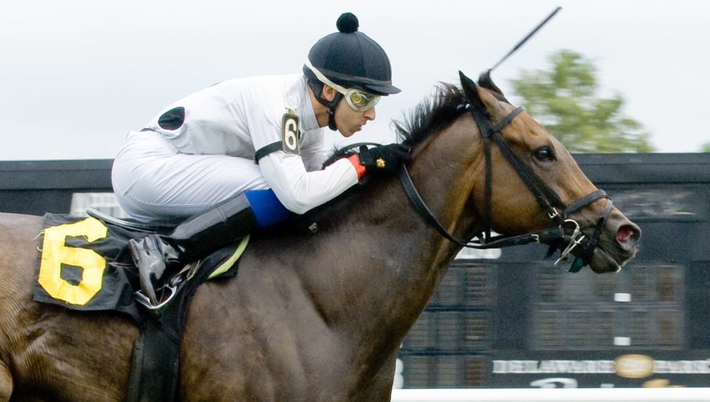 Alex Cintron, winning at Delaware Park in 2012. Photo by Hoofprintsinc.com