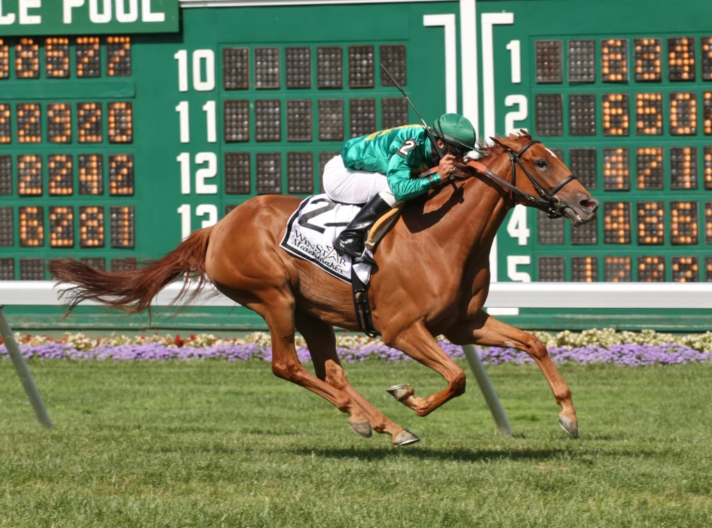 Casual Smile and Abel Castellano rallied late to win the G3 Matchmaker on the Haskell undercard. Photo By Taylor Ejdys/EQUI-PHOTO.