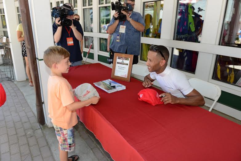 Kendrick Carmouche signs for the fans. Photo by NYRA/Adam Coglianese.