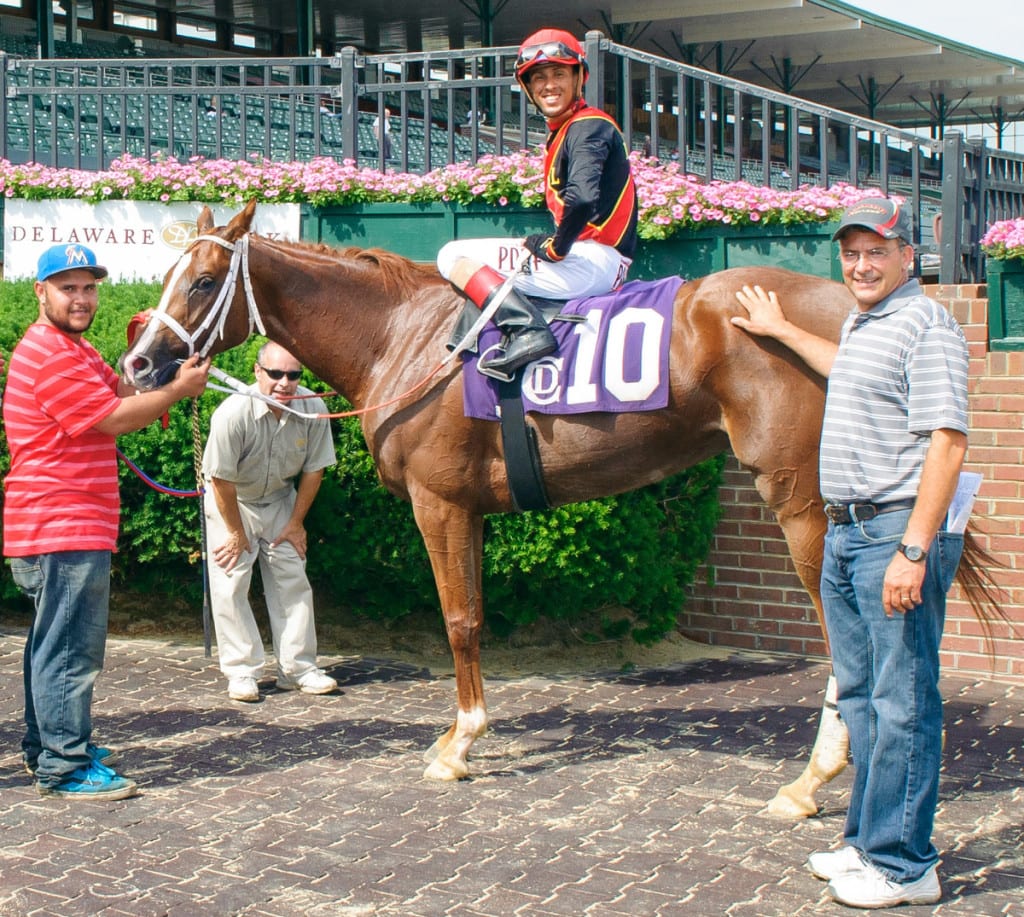 Gary Capuano, right, with Intrepid Alex winning at Delaware Park in June. Intrepid Alex is Delaware-certified. Photo by HoofprintsInc.com