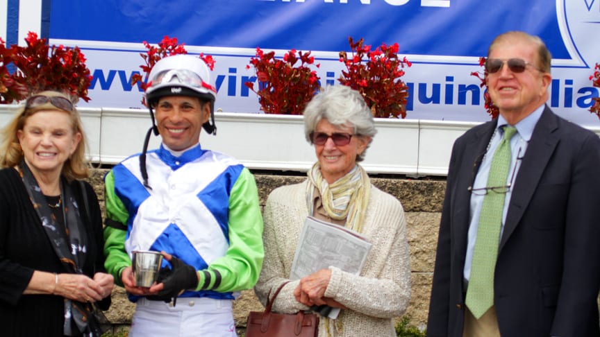 Roy and Gretchen Jackson (far right, second from right), joined jockey Daniel Centeno in the winner's circle after Exaggerated won the Oakley. Photo by Laurie Asseo.