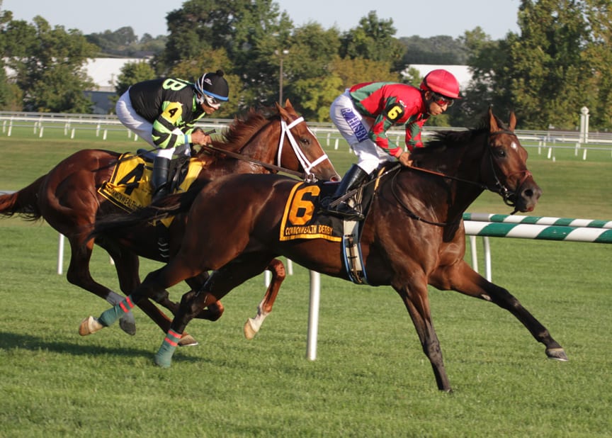 One Go All Go and Ronald Hisby cleared to an early lead en route to winning the Commonwealth Derby. Photo by Laurie Asseo.