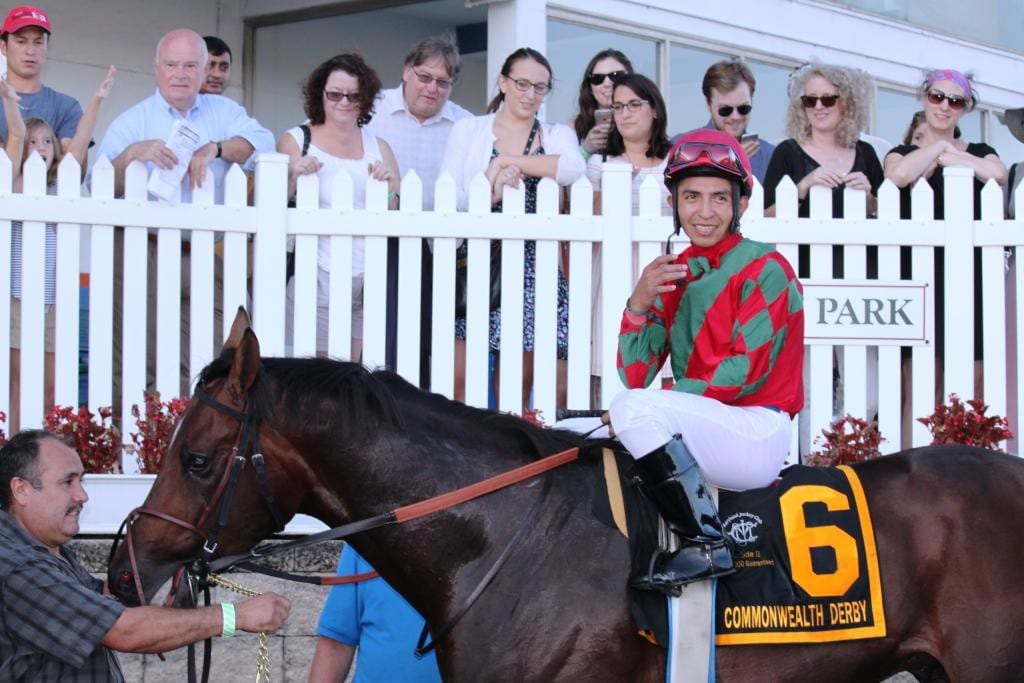 Ronald Hisby smiles for the cameras after winning the Commonwealth Derby. Photo by Nick Hahn.