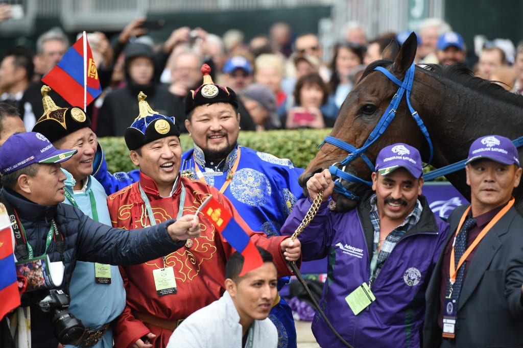 Smiles abounded from the members of Mongolian Stable after their Mongolian Saturday upset the Turf Sprint. Photo by © Breeders' Cup/Weasie Gaines 2015