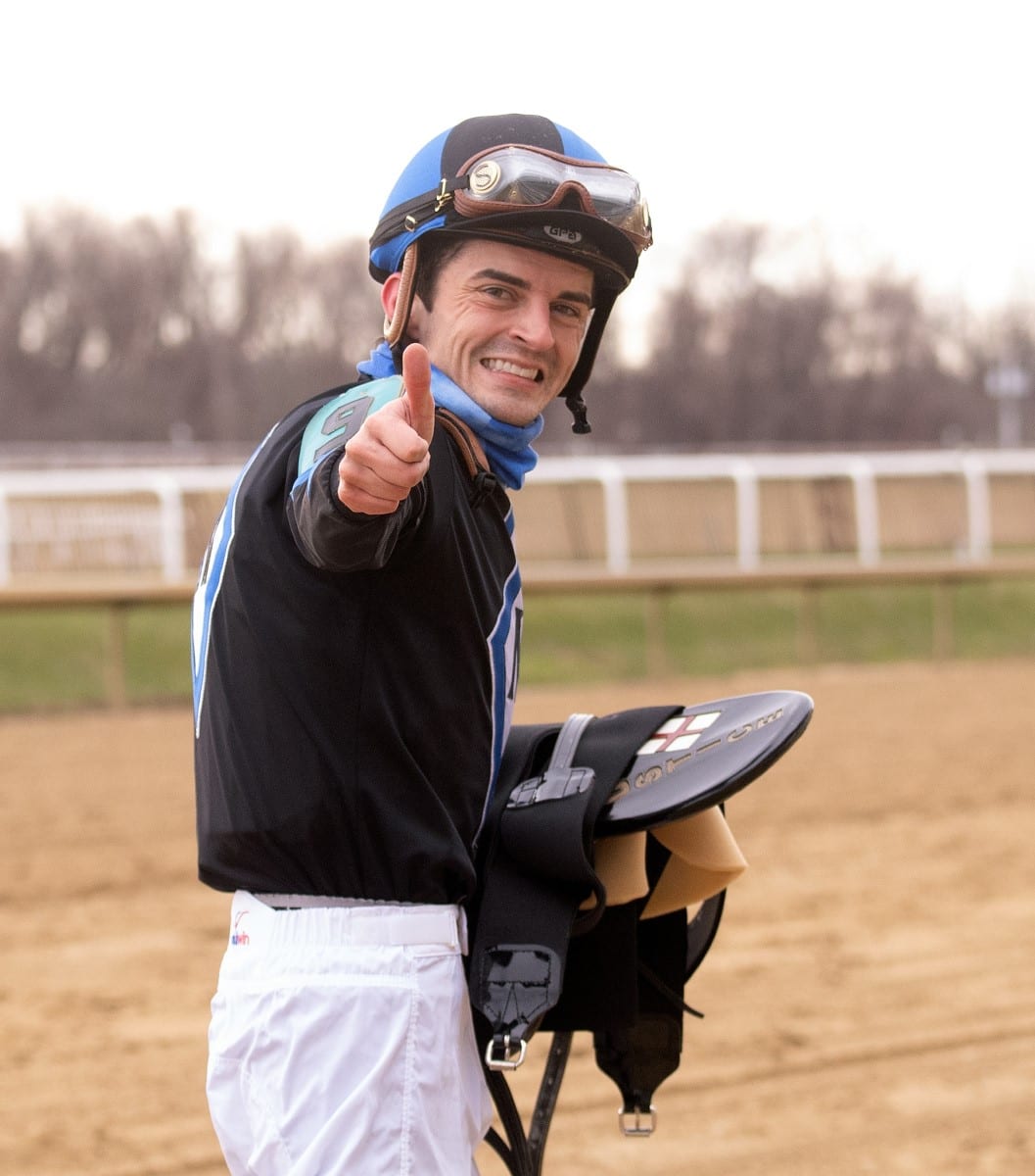 Thumbs up for leading rider Sheldon Russell. Photo Jim McCue, Maryland Jockey Club.