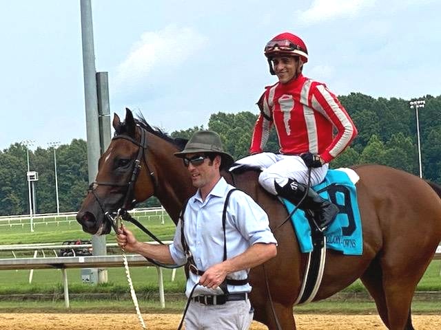 Jevian Toledo won the Meadow Stable Stakes aboard Grateful Bred. Photo by Nick Hahn.