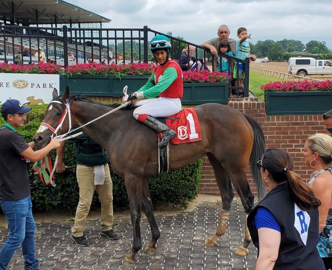 Carol Cedeno and Mama G's Wish in the winner's circle. Photo Mike Valiante.