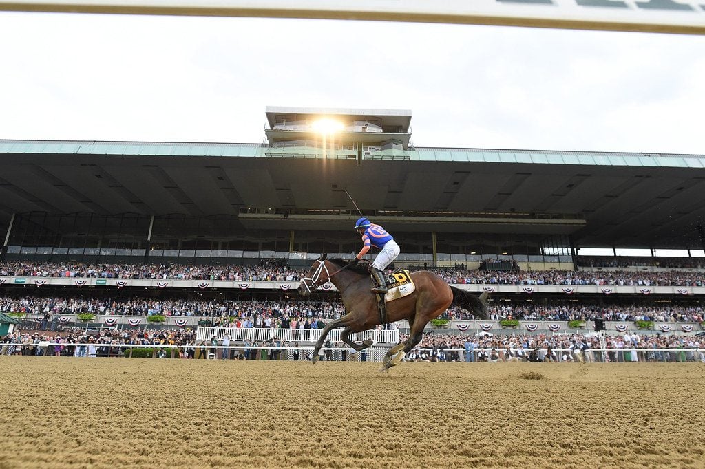 Jockey Irad Ortiz, Jr. exults as Mo Donegal wins the Belmont Stakes. Photo by NYRA.