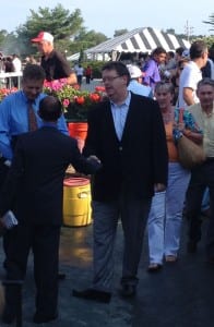 Trainer Dale Romans accepts congrats after Guys Reward wins the Oceanport. Photo by The Racing Biz.