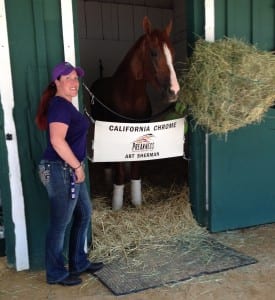 Jessica Lindsey visits California Chrome in the days before the Preakness. Photo by The Racing Biz.