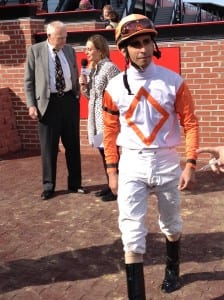 Julian Pimentel leaves the winner's circle after riding Ben's Cat to victory.  He'll ride Kid Cruz in the Preakness.  Photo by The Racing Biz.